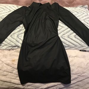 A long sleeve black latex dress (never worn)